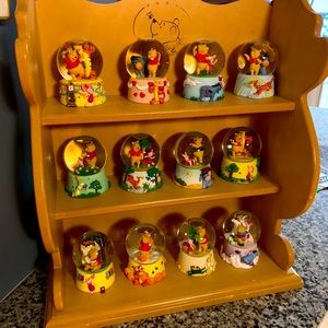 Winnie the Pooh 12 month snow globes with shelf